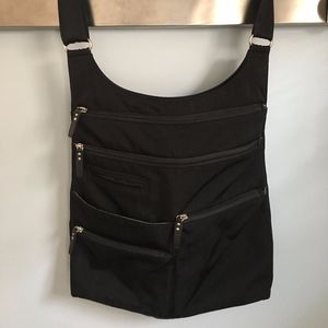 Highway black nylon shoulder bag with pockets.
